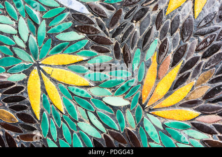 flower mosaic pattern with green yellow and black colour top view Stock Photo
