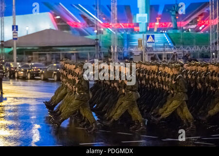 Minsk, Belarus- June 28, 2017:  Soldiers Marching At Street During Night Rehearsal Of Parade Before Celebration Of Independence Day Of Belarus. Stock Photo