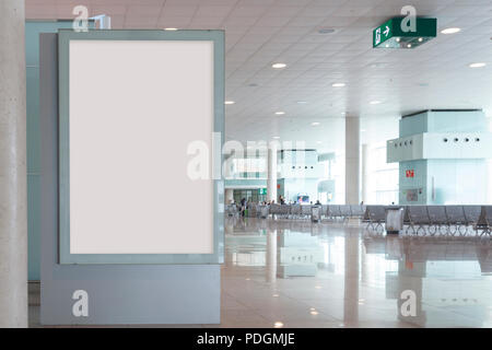 Blank billboard mock up in an airport, with unfocused background Stock Photo