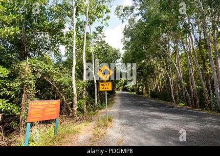 Road sign warning of cassowaries crossing the road, Daintree National Park, Cape Tribulation, Far North Queensland, FNQ, QLD, Australia Stock Photo