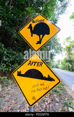 Humorous graffiti on a road sign warning of cassowaries crossing the road, Daintree National Park, Cape Tribulation, Far North Queensland, FNQ, QLD, A Stock Photo