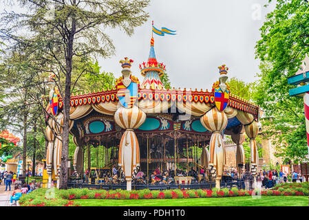 CASTELNUOVO DEL GARDA, ITALY - MAY 1: Old fashioned vintage carousel at Gardaland Amusement Park, near Lake Garda, Italy, May 1, 2018. The park attrac Stock Photo