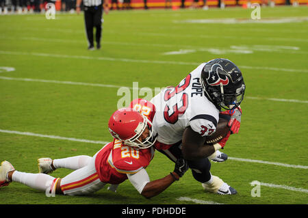Kansas City, UK. August 09, 2018: Houston Texans running back Troymaine Pope (33) makes a first half reception as Kansas City Chiefs cornerback Steven Nelson (20) makes the tackle during the NFL Pre-Season Football Game between the Houston Texans and the Kansas City Chiefs at Arrowhead Stadium in Kansas City, Missouri. Kendall Shaw/CSM Stock Photo