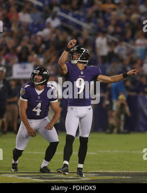 Baltimore Ravens' Justin Tucker (9) attempts a field goal as Sam