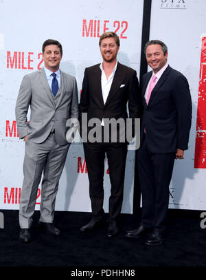 WESTWOOD, CA - AUGUST 09: (L-R) Executive Producers Matthew Rhodes, Jonathan Gray and Judd Payne attend the premiere of STX Films' 'Mile 22' on August 9, 2018 at Mann Village Theatre in Westwood, California. Photo by Barry King/Alamy Live News Stock Photo
