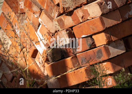 Close up of stacked red clay bricks Stock Photo