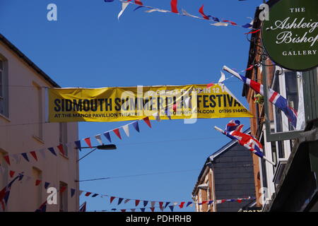 Sidmouth's Fore Street Decorated with Bunting and Union Jack Flags During the Folk Festival. East Devon, UK. August, 2018. Stock Photo