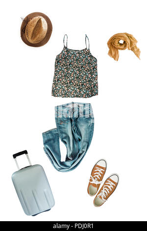 woman clothes collage on white, flat lay, top view.Clothing and accessories (suitcase, hat) for travel. Collage, montage. Stock Photo