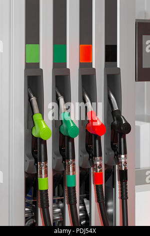 Color Coded Fuel Nozzles at Petrol Station Stock Photo - Alamy