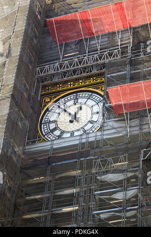 the Elizabeth Clock tower, housing Big Ben bell, covered in scaffolding during exrensive repairs and renovation. Palace of Westminster, Houses of Parl Stock Photo