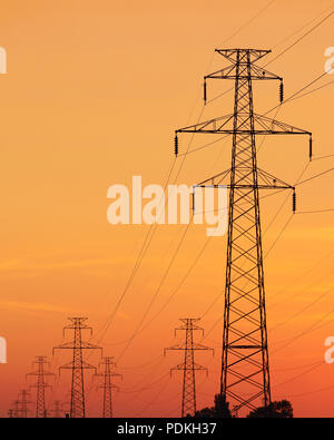 Electricity Pylon at Sunset Stock Photo