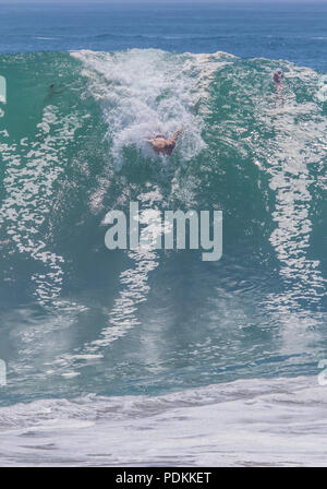 Bodysurfing at the world famous Wedge in Newport Beach California Stock Photo