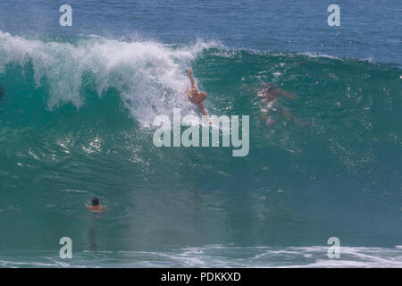 Bodysurfing at the world famous Wedge in Newport Beach California Stock Photo