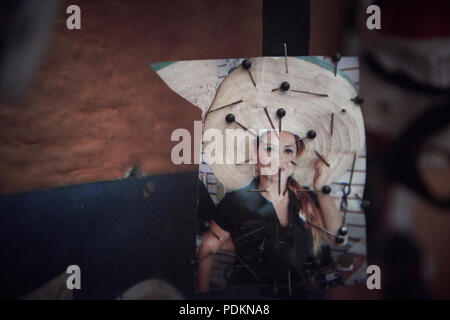 Black magic Brujos or witch doctors, in Catemaco, Veracruz.  Surrounded by dried animals, candles and other objects of black witch craft in Catemaco, Mexico. Stock Photo