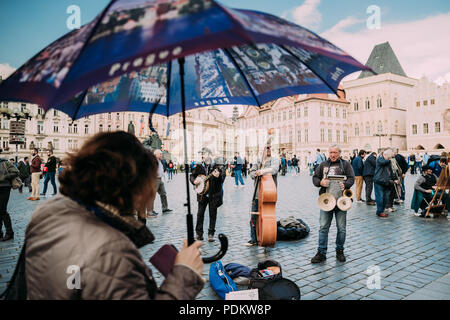 Prague, Czech Republic - September 22, 2017: Street Busker Performing Jazz Songs At Old Town Square In Prague. Busking Is Legal Form Of Earning Money  Stock Photo