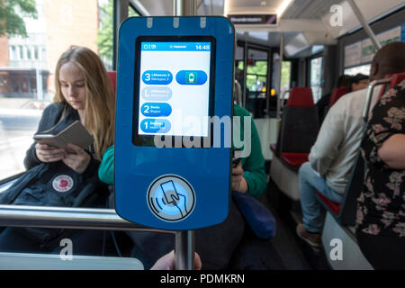HSL Card and Visitor Card reader in Helsinki Tram. Contactless smart card electronic ticket validator. Tram ticket swiping machine. Stock Photo