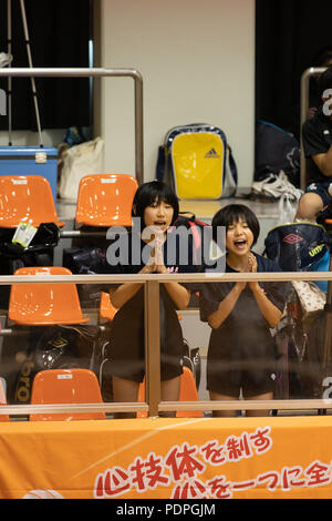 Cheering girls at Volley Ball Match Stock Photo