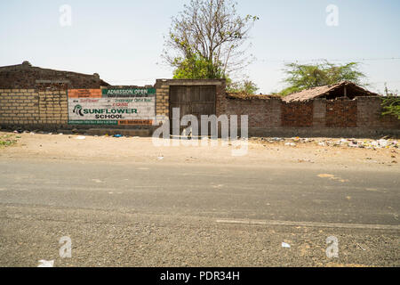 A typical brick wall of a house in rural Gujarat in India Stock Photo