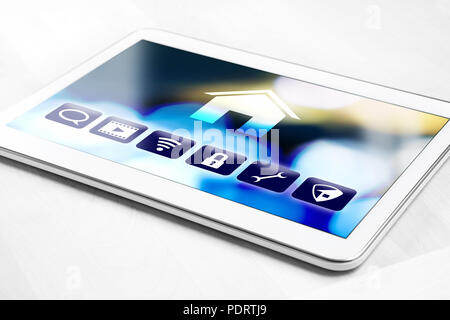 Tablet with smart home control system for house appliances. Remote controller app on smart device. Modern futuristic internet of things (IOT). Stock Photo