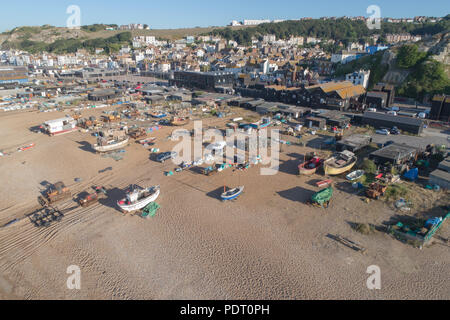 fishing boats on the seafront at the stade or old town of Hastings on the east sussex coast Stock Photo