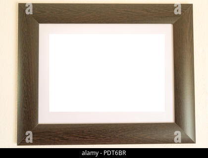 Empty wooden frame with white area to write on Stock Photo