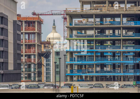 New construction rises in southeast Washington, DC between Nationals Park stadium and the U.S. Capitol. Nationals parking garage roof is in foreground Stock Photo