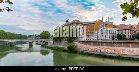 Panorama of the Tiber River in Rome, Italy with the Church of the Sacred Heart of Jesus in Prati and a bridge across the river on the background Stock Photo