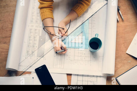 Top view of architect drawing on architectural project Stock Photo