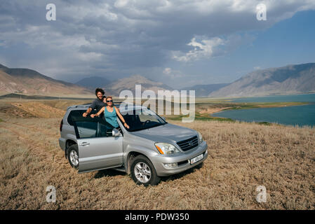A couple having fun in Kyrgyzstan Stock Photo