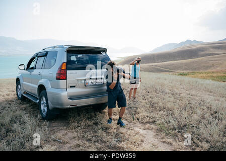 A couple having fun in Kyrgyzstan Stock Photo