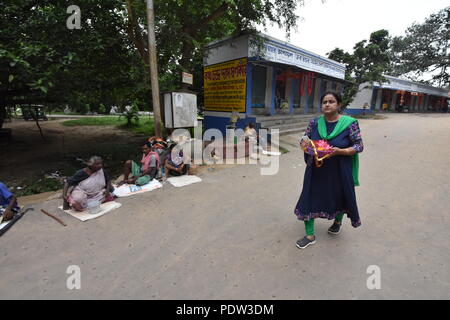 A hindu lady is approaching for puja to the Kankalitala mandir near Prantik railway station in the district Birbhum, West Bengal, India. It is one of  Stock Photo