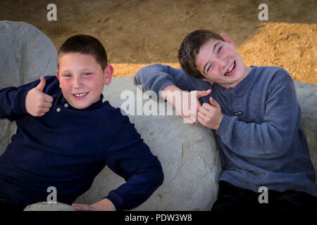 Brothers outside smiling at camera   © Myrleen Pearson  ....Ferguson Cate Stock Photo