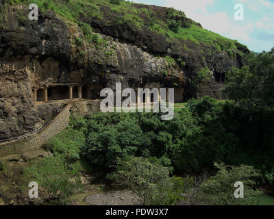 Ancient caves carved into the mountainside in india Stock Photo