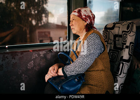 People on the streets of Karakol, Kyrgyzstan Stock Photo