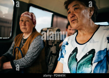 People on the streets of Karakol, Kyrgyzstan Stock Photo