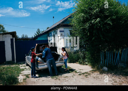 People on the streets of Karakol, Kyrgyzstan Stock Photo