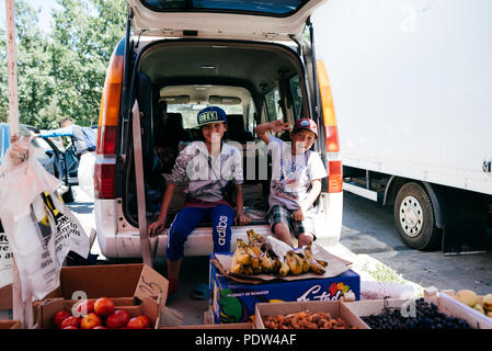 People on the streets of Karakol, Kyrgyzstan Stock Photo