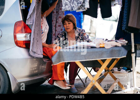 People on the streets of Karakol, Kyrgyzstan Stock Photo