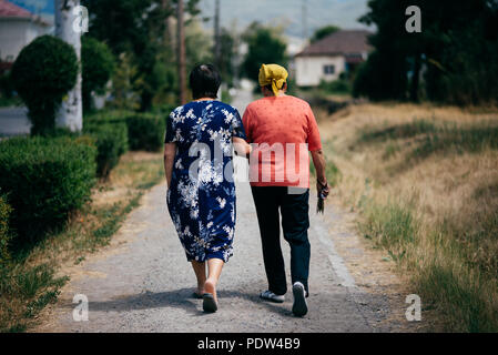 People on the streets of Karakol, Kyrgyzstan Stock Photo