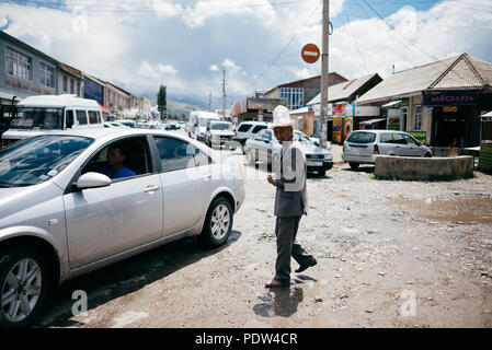 People on the streets of Karakol, Kyrgyzstan Stock Photo