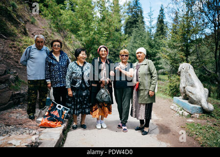 People on the streets of Karakol, Kyrgyzstan Stock Photo