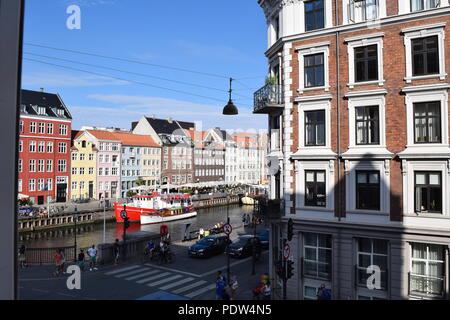 The Canal and Street in Nyhavn, Copenhagen Viewed from a Window Stock Photo