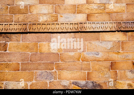 Brown big brick stone wall in India Stock Photo