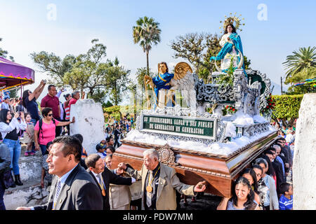 San Juan del Obispo, Guatemala -  January 1, 2017: Catholic procession on New Year's Day in village near UNESCO World Heritage Site of Antigua. Stock Photo