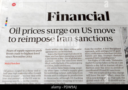 'Oil prices surge on US move to reimpose Iran sanctions'  newspaper headlines in the Financial section of the Guardian paper in London UK 2018 Stock Photo
