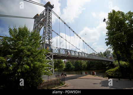 The queens park suspension bridge over the river dee in chester cheshire england uk Stock Photo