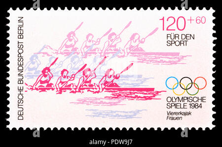 German postage stamp (Berlin: 1984) : 'Fur den Sport' (charity stamp funding sport) 1984 Olympics: women's kayak fours Stock Photo