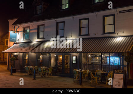 Cote Brasserie, St Thomas's Square, Salisbury, Wiltshire at night Stock Photo