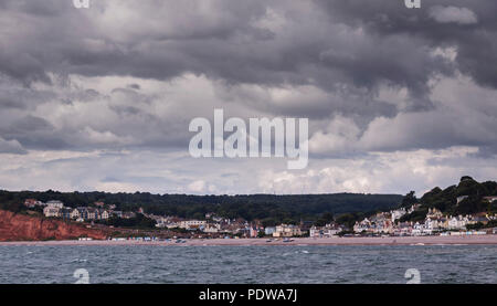 Panoramic view of dark skies over Budleigh Salterton, Devon, from the sea Stock Photo