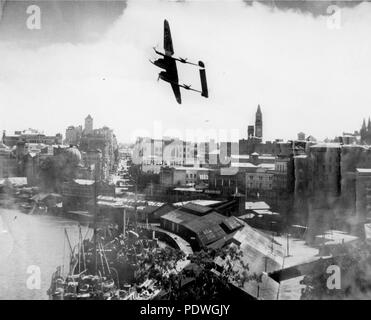 234 StateLibQld 1 158944 View of Queen Street and the wharves on the Brisbane River, Brisbane, Queensland, ca.1943 Stock Photo